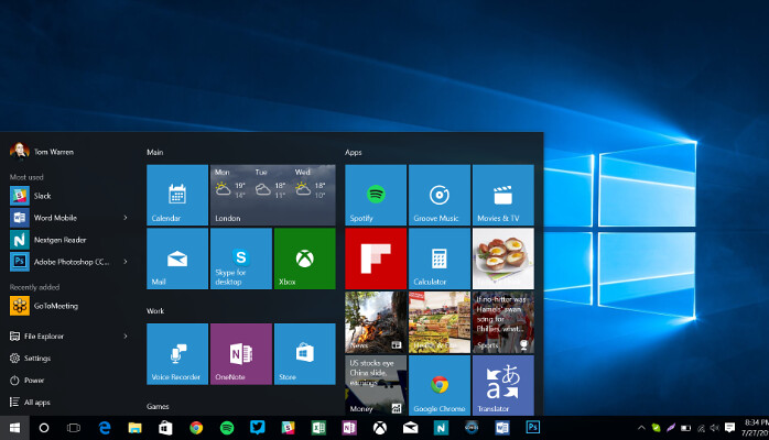 The Windows 8 start menu opened with a number of programs and applications available including Slack and Word.