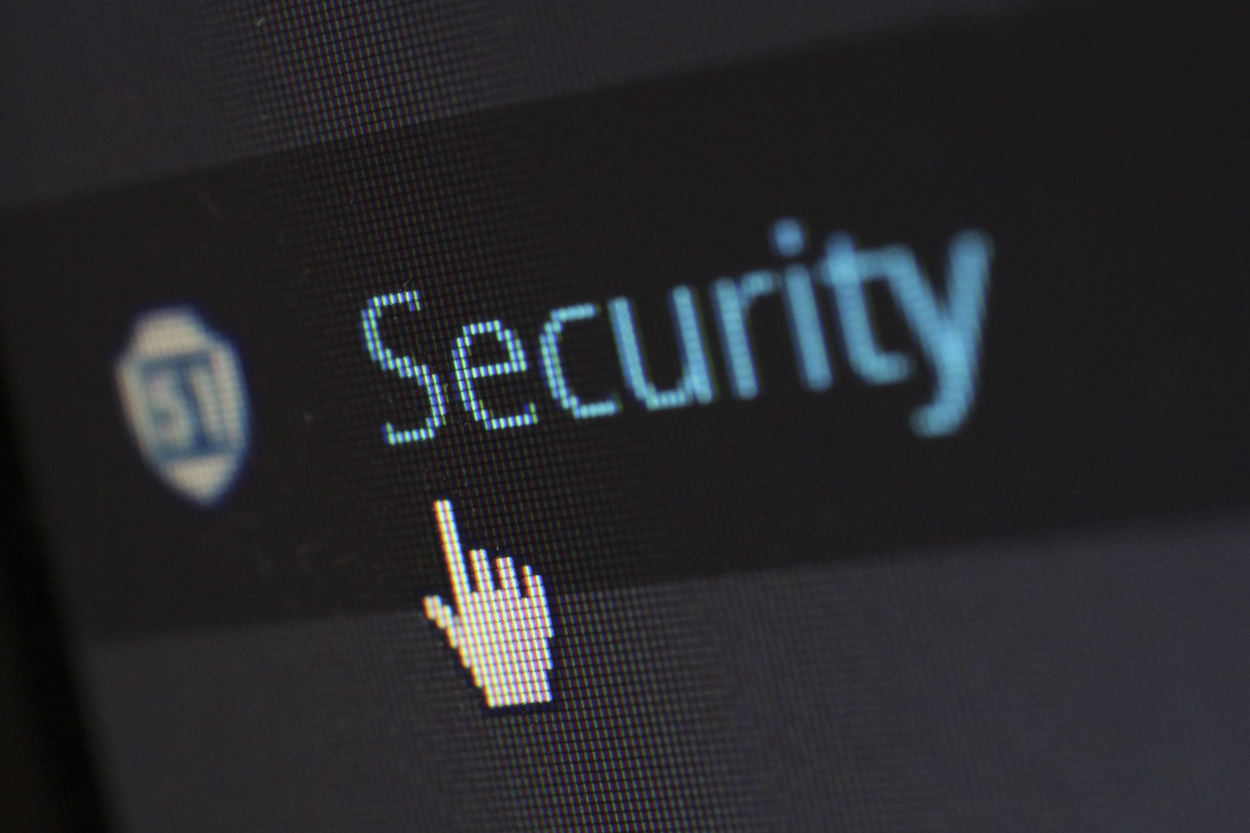 A photo of a computer screen. The cursor is pointing to the word "security"