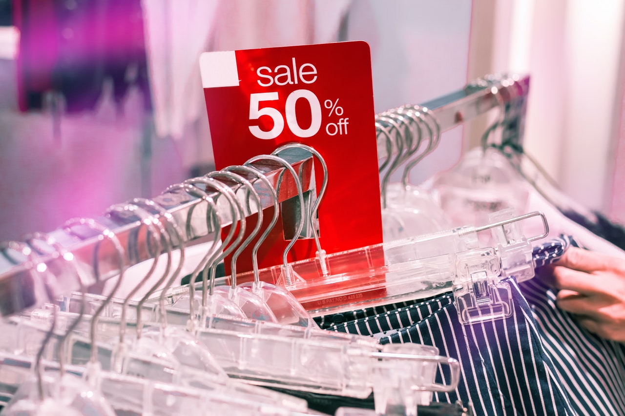 Clothing rack with tag: Sale 50% off
