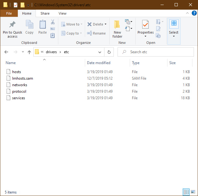 Windows File Explorer with the hosts file shown in its default location