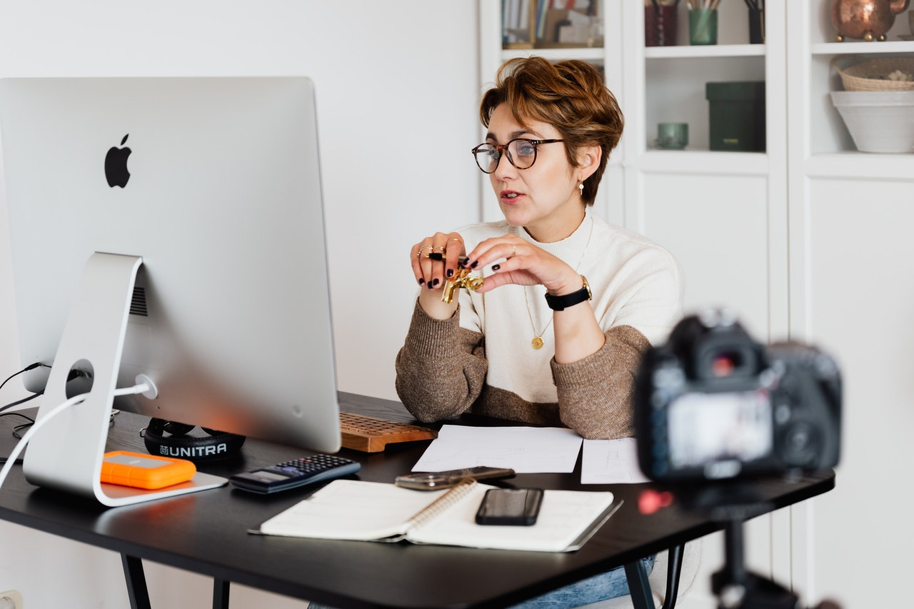 Woman having a virtual meeting at her home office