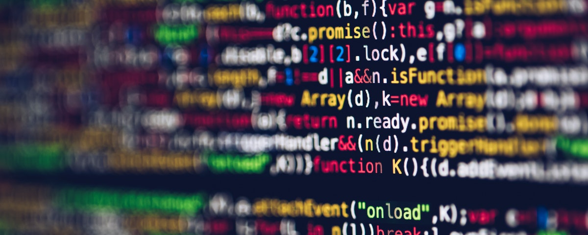 zoomed in shot of color-coded software code on a computer screen