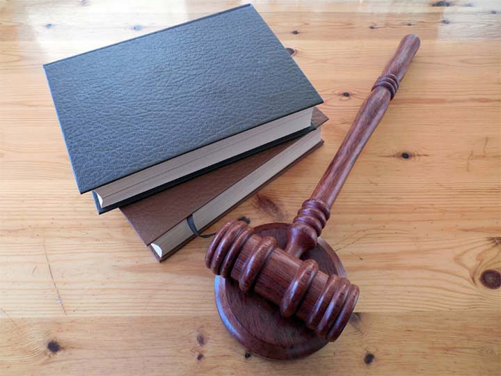 A judge's gavel and books