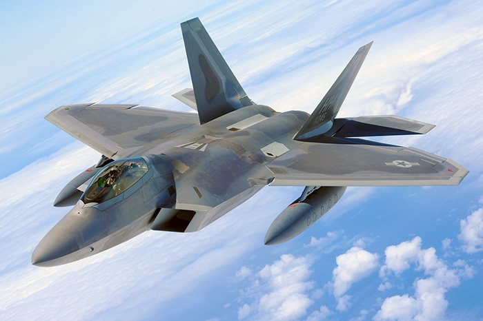 Fighter jet flying high in the atmosphere
